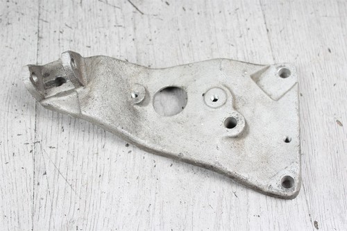 Footrest retaining plate