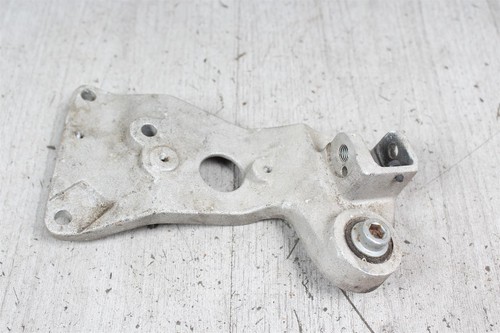 Footrest retaining plate